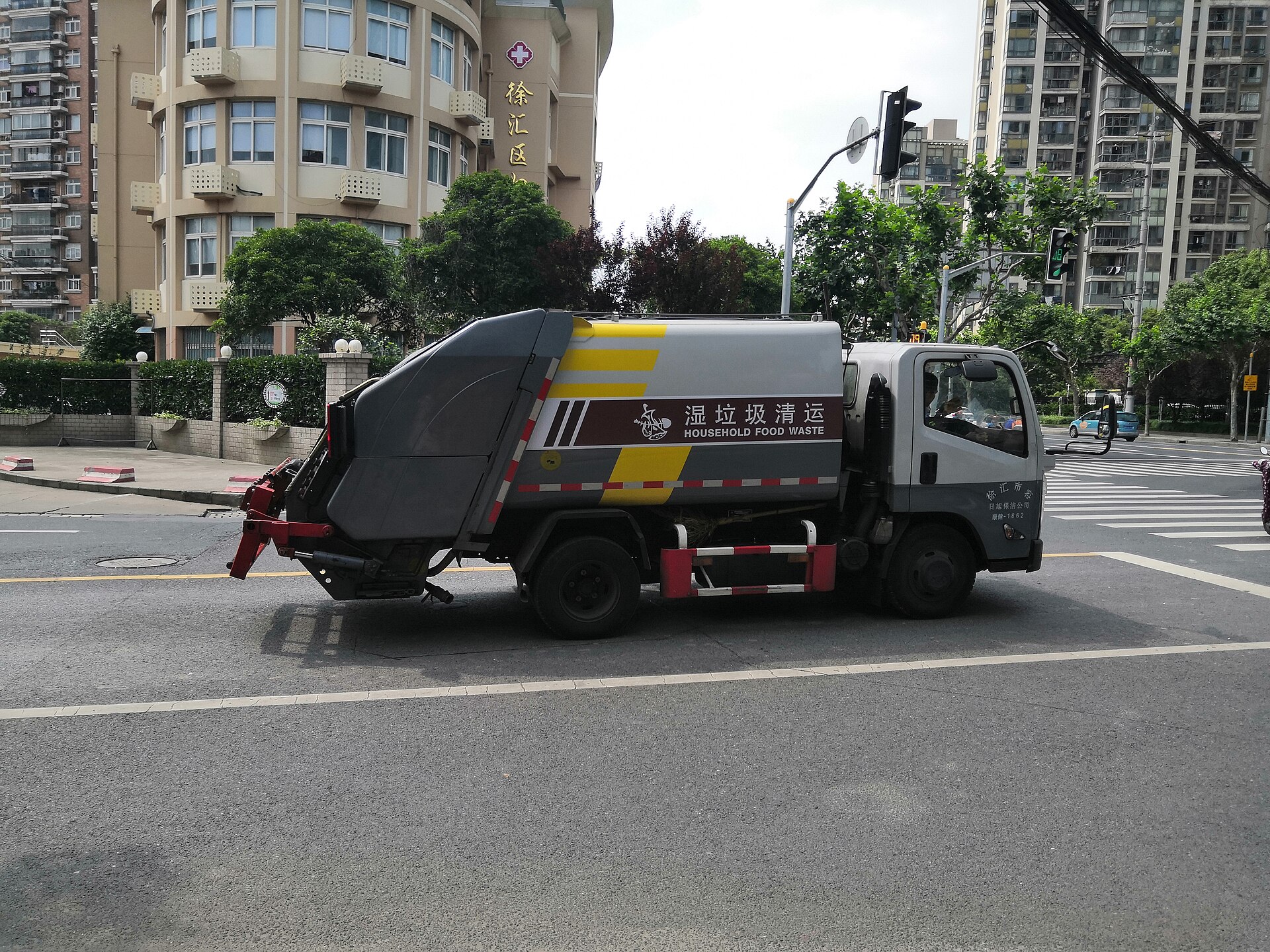 A dedicated food-waste collection round. The whole system depends on this material never touching the mixed-waste stream.