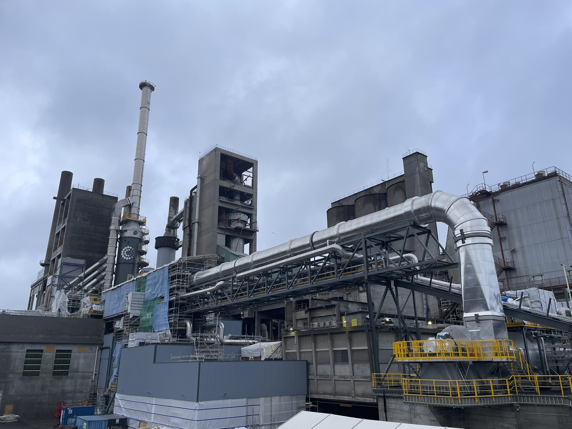 Carbon capture plant at a cement works. Producing a concentrated CO2 stream is the easy half; compression, transport, and a buyer are the rest of it.