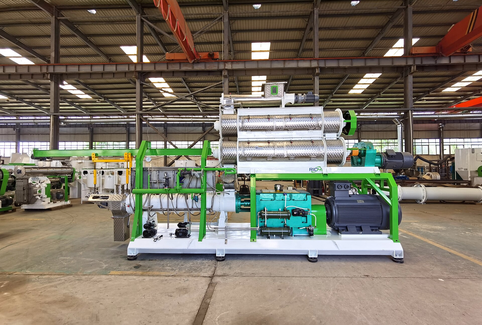 A twin-screw extruder. Already standard equipment in plastics processing, which is part of why this route is credible.