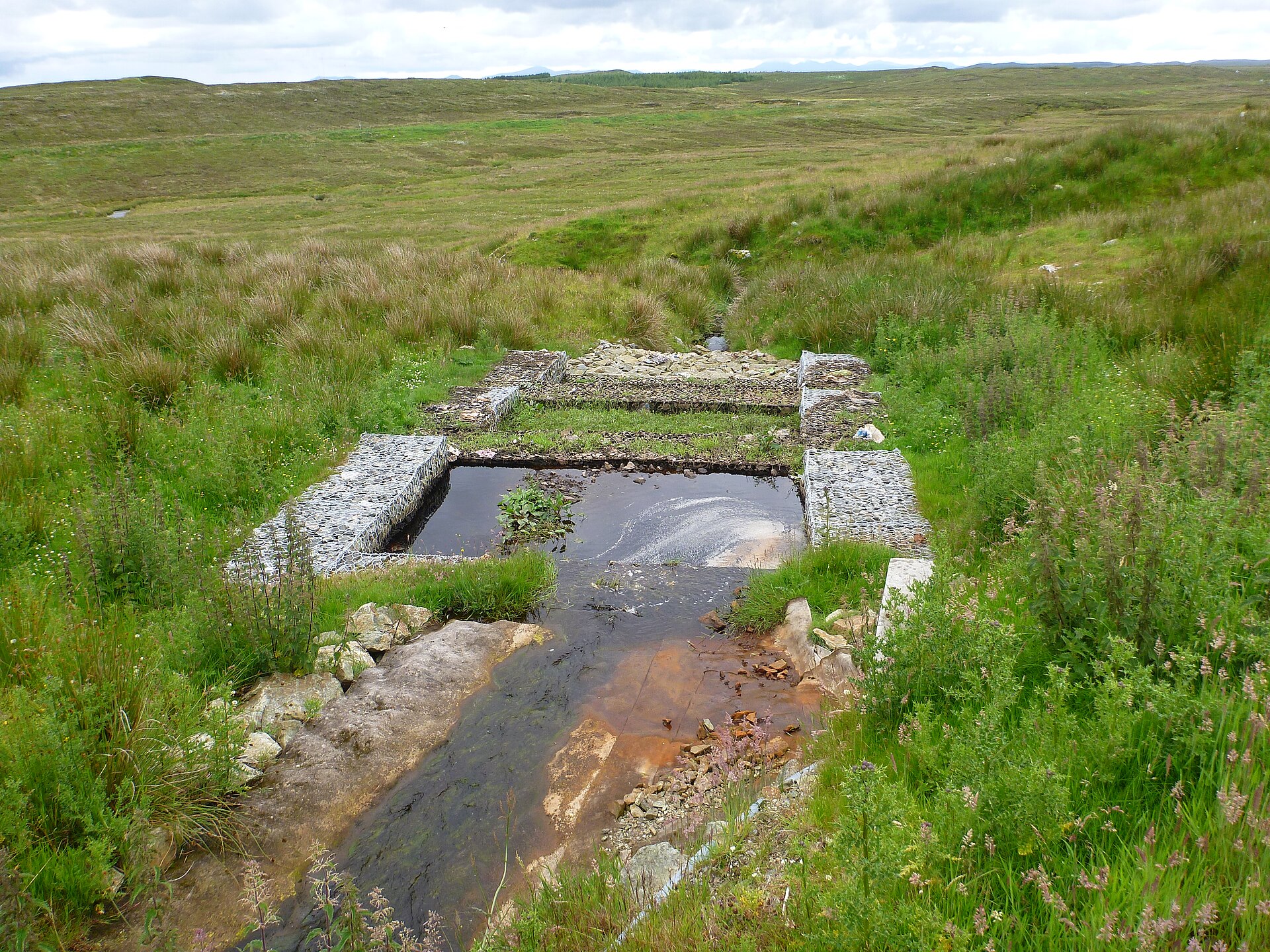 Leachate leaving a site. Where it goes next is a treatment-capacity question that most municipal plants have not sized for a temperature event.