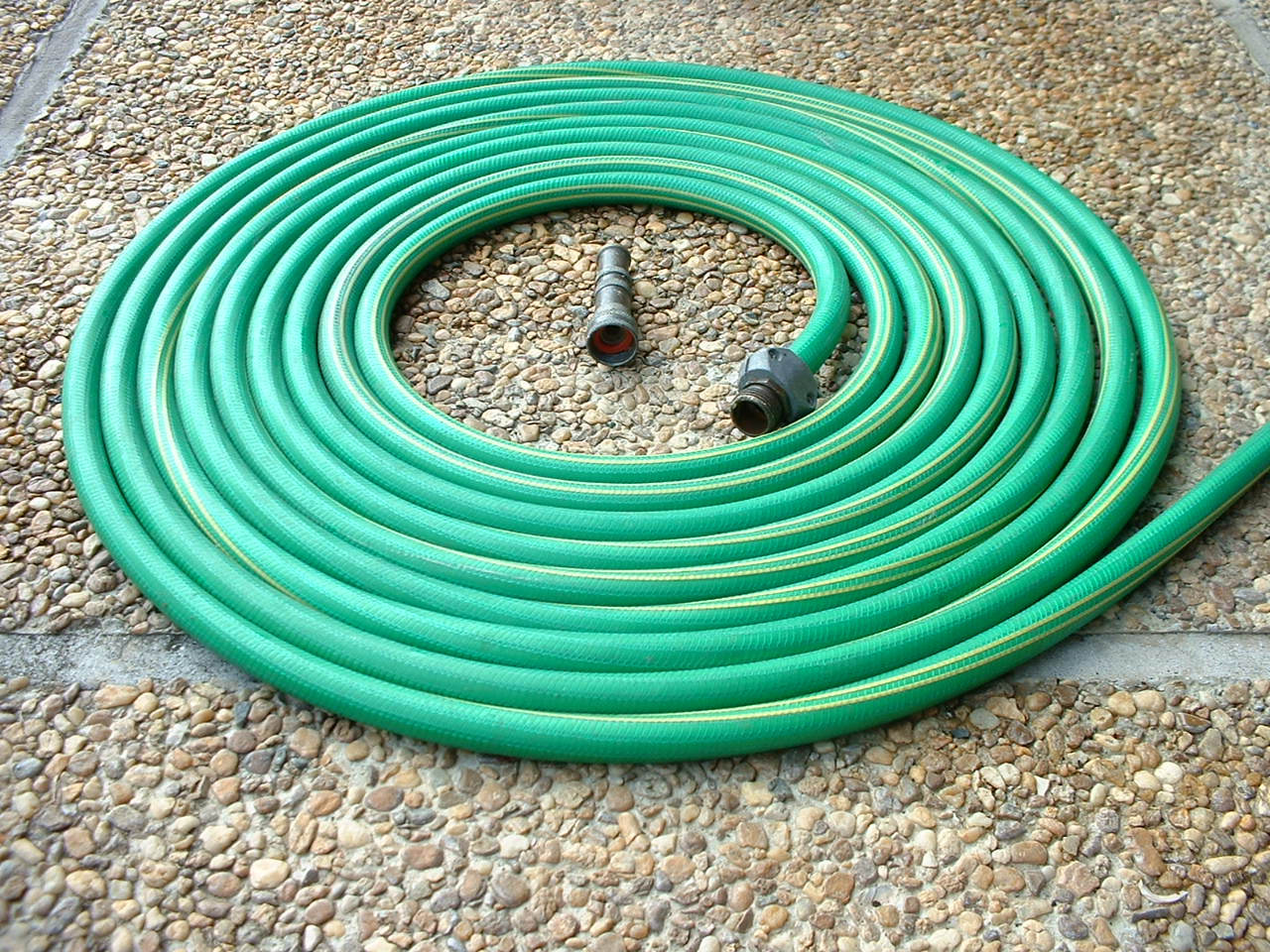 A garden hose is the archetype of the category — long, flexible, and capable of jamming a screen deck for an hour.