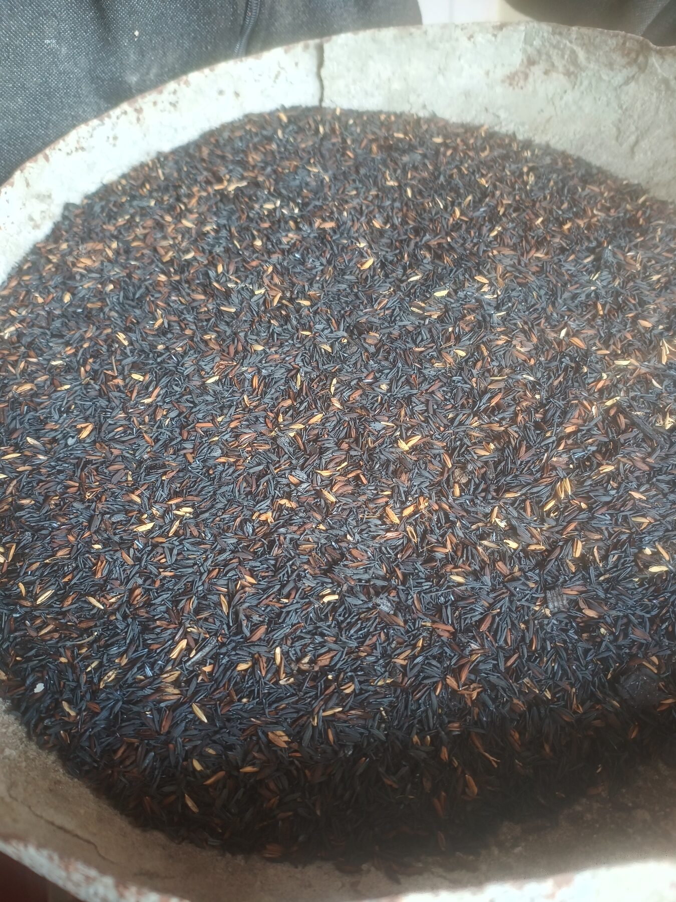 Rice husk is close to an ideal feedstock: a true processing residue with no competing soil role.