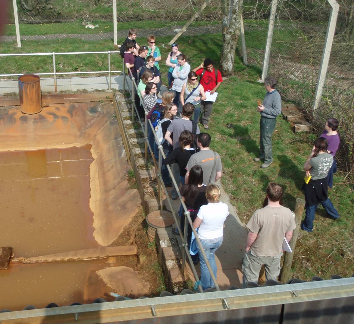 A leachate lagoon. Storage sized for normal production becomes the binding constraint when production multiplies.