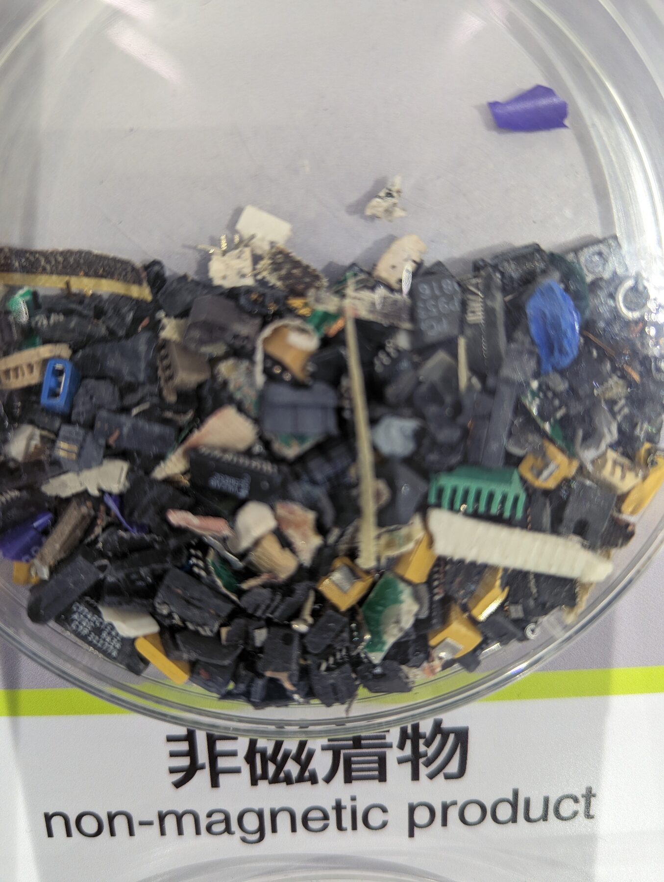 Mixed e-scrap. Somewhere in here there are magnets; nobody is going to find them economically by hand.