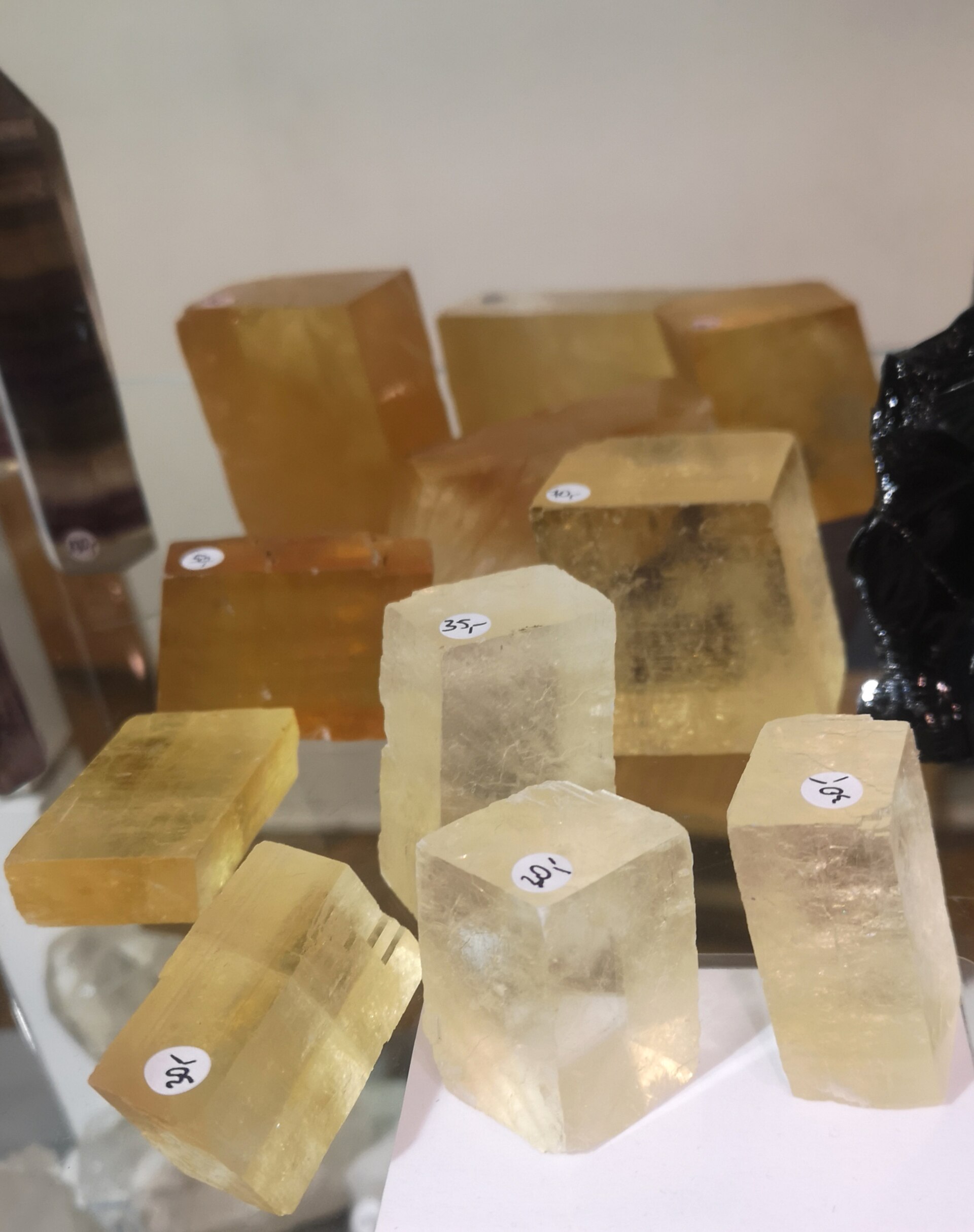 Calcite. The same mineral, grown slowly, is what the reactor is trying to make quickly.