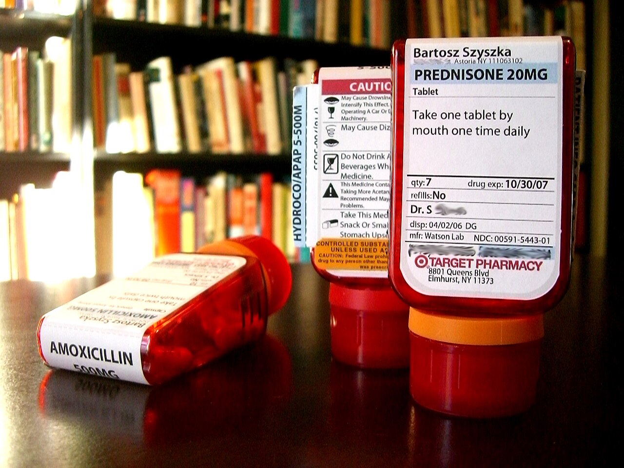 Before disposal, remove or obscure personal information on the label. The container and the contents are two separate problems.