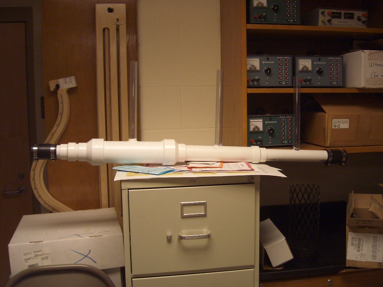 A Venturi constriction. The geometry that makes cavitation a nuisance in pumps is the same geometry that makes it a reactor.